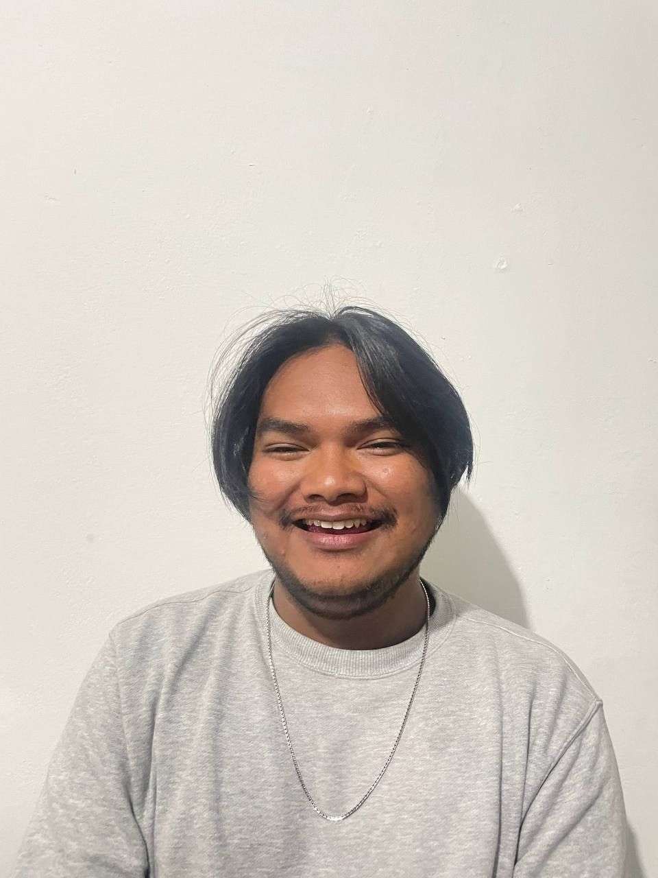 Portrait of Ahmad Rosmana